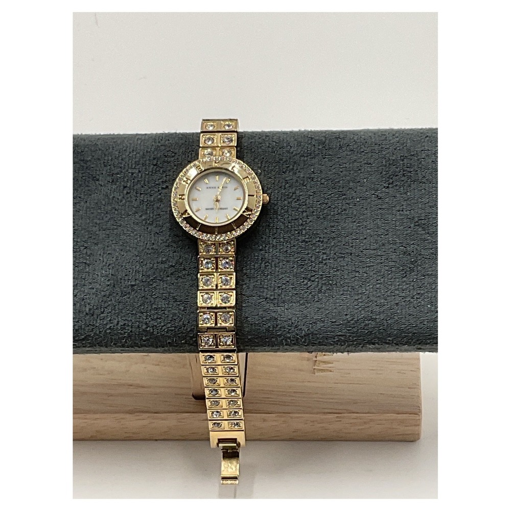 Anne Klein Women's Gold Tone Crystal Dress Watch AK/1034, 100ft‎ WR